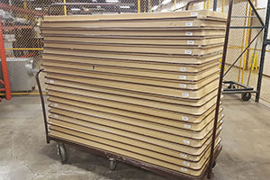 Good stack of tables-bottom of table up and stacked evenly with 20 to a cart maximum.